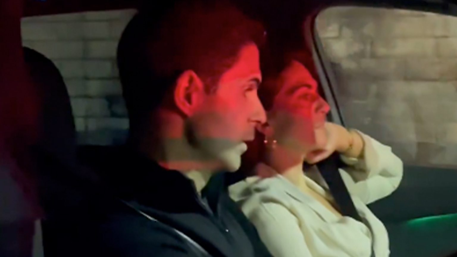 Awkward moment Mikel Arteta and his wife are swarmed by Arsenal fans in their car after win over Atletico Madrid