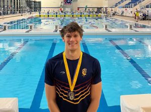 Danny Kish sets new Cayman swimming record