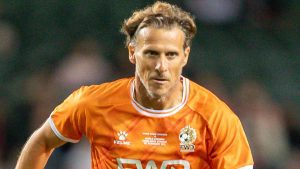 Ex-Man Utd striker Diego Forlan suffers three broken ribs and rushed to hospital after collision in veterans match