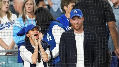 Harry and Meghan brutally ‘booed’ by World Series crowd after appearing on big screen at Dodgers-Blue Jays