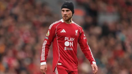 Why is Alexis Mac Allister wearing a hat during Liverpool vs Man Utd? Why is Alexis Mac Allister wearing a hat during Liverpool vs Man Utd?