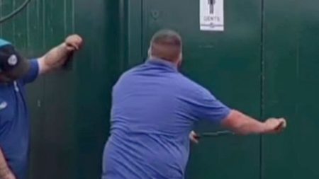 Awkward moment speedway star is trapped in TOILET with worker forced to use crowbar to break door open