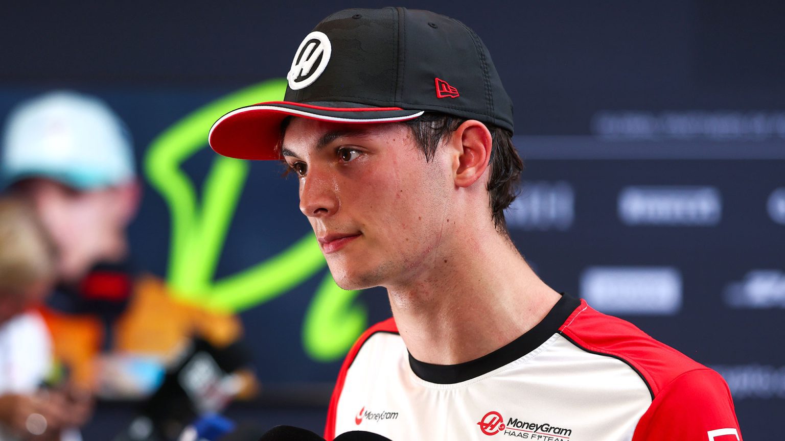 Brit F1 star Oliver Bearman dangerously close to race ban as he’s caught in tense conversation with Liam Lawson