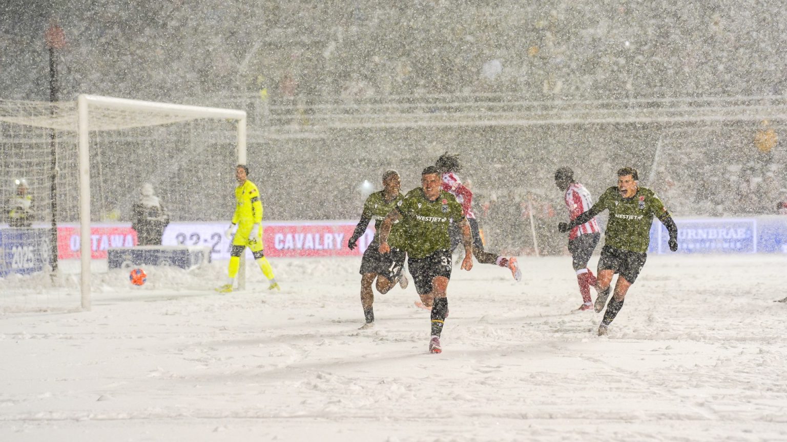 ‘Built different’ – Moment ex-Rangers star knee slides in BLIZZARD conditions before suffering cup final heartbreak
