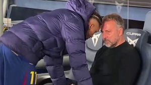 Devastated Hansi Flick consoled by Raphinha after Barcelona’s 3-1 win to go top of LaLiga