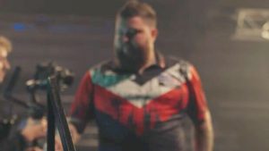 Former darts World Champion breaks down in tears following win at Grand Slam after eight months away with health issues