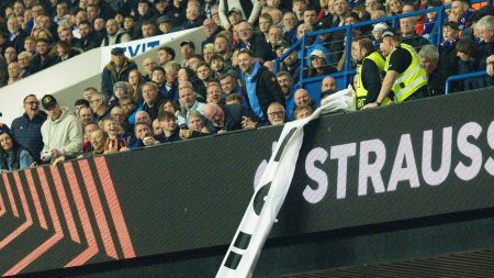 Moment Rangers fans snatch banner straight from steward’s hands after struggle before redisplaying it in stands