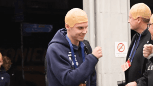 Rangers star spotted wearing a BALD CAP in bizarre tribute to retiring ex-Celtic ace