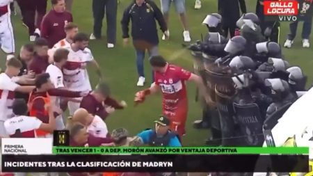 Shocking moment footballers are pepper sprayed by riot police after ATTACKING cops and rivals in chaotic play-off clash