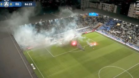 Swedish football match descends into chaos with pitch set on fire and referee hauling players off the pitch Swedish football match descends into chaos with pitch set on fire and referee hauling players off the pitch
