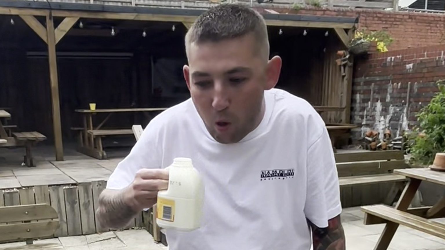 Watch darts star Nathan Aspinall retch and vomit after being forced to do disgusting fantasy football forfeit