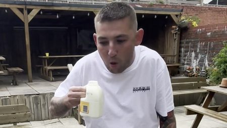 Watch darts star Nathan Aspinall retch and vomit after being forced to do disgusting fantasy football forfeit