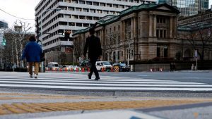 Japan business mood hits 4-year high, keeps alive BOJ rate-hike view