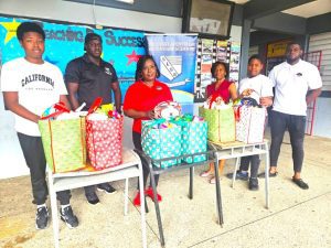 School Rugby Union, GEB bring Christmas cheer to Success Laventille
