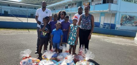 Dennery Falcons Athletics Club spreads Christmas cheer with hampers