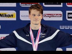 French Olympic swimming champion to stand trial on rape, sexual assault charges | Sports