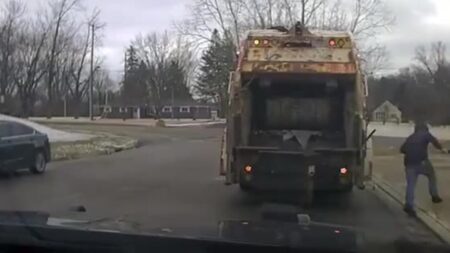 Sanitation worker surprised to find Huber Heights Police suspect in trash can